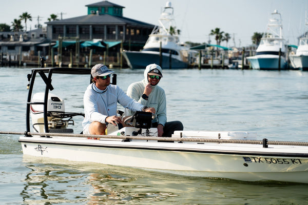 anglers wearing hats and sunglasses for fishing in heat