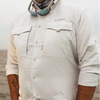 Man wearing  Dagon's light gray gingham shirt for fishing 