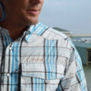 Man wearing Dagon's madras blue shirt