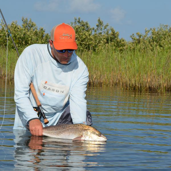 powder blue hoodie on fly fishing