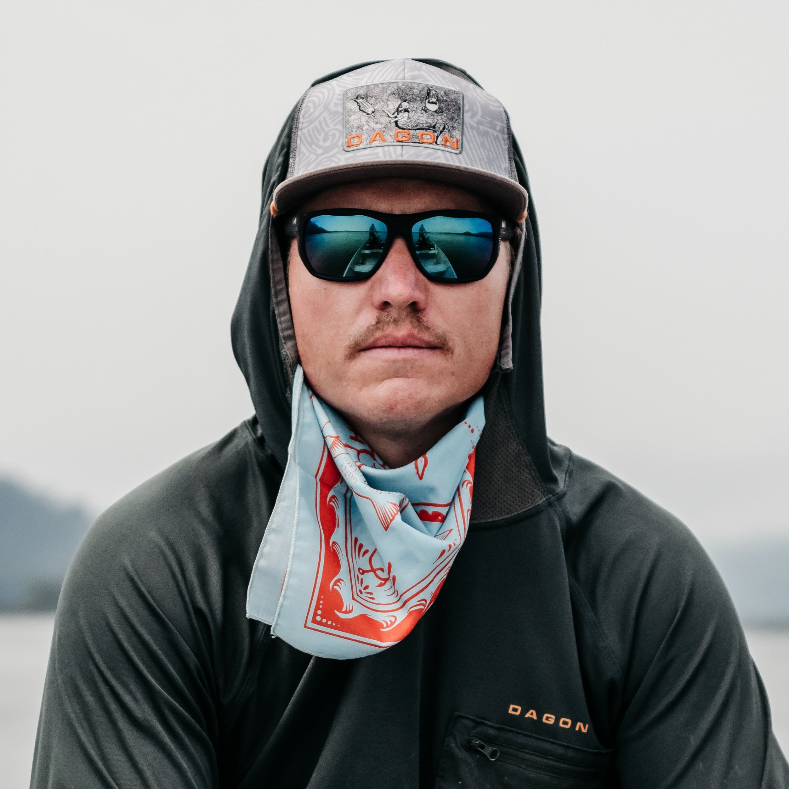 man wearing Dagon classic fish god hat.